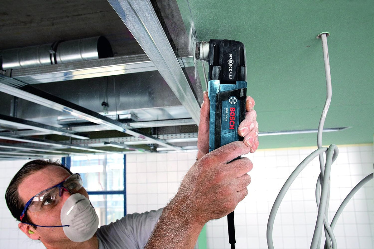 Bosch Professional: narzędzie wielofunkcyjne Multi-Cutter GOP 30-28 (300 W, uchwyt narzędziowy Starlock, klucz sześciokątny, brzeszczoty i płyta szlifierska delta, walizka L-BOXX)